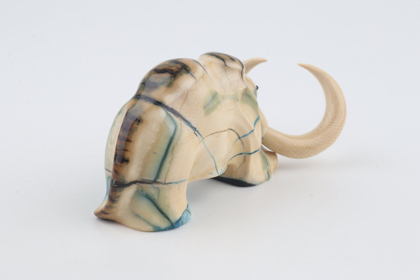 Hand-carved woolly mammoth figurine