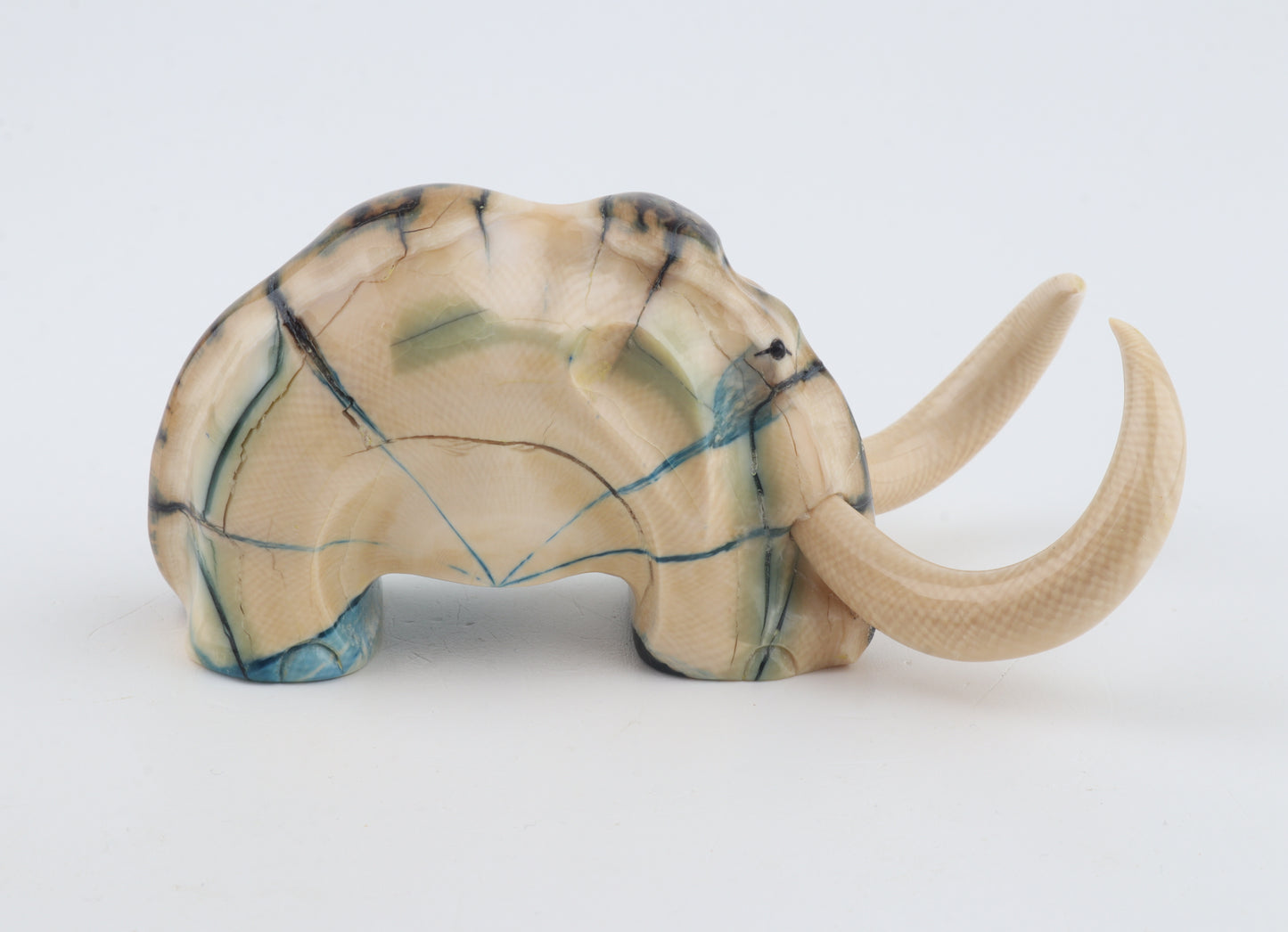 Hand-carved woolly mammoth figurine