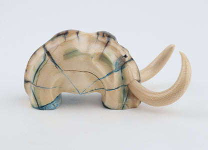 Hand-carved woolly mammoth figurine
