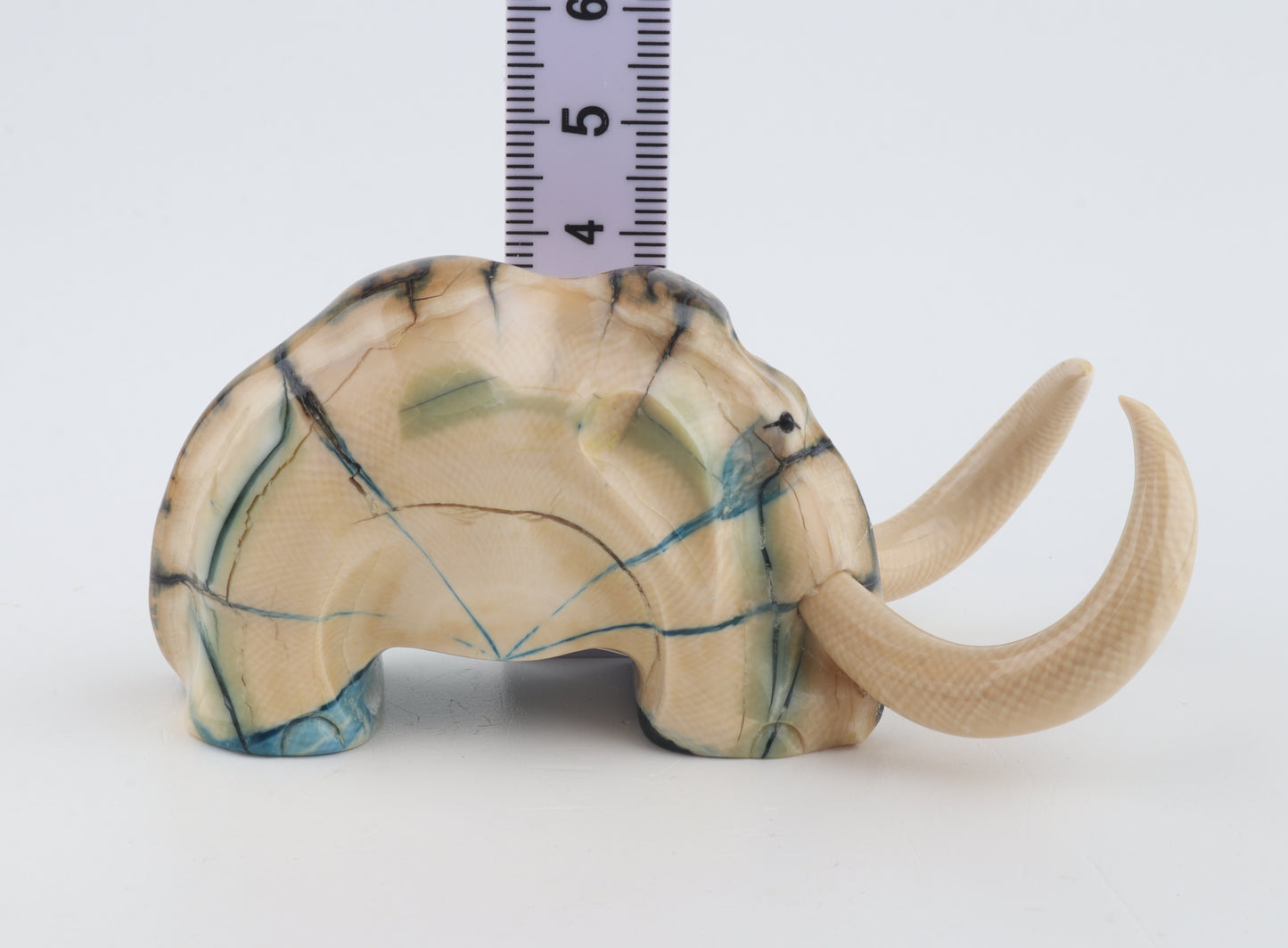 Hand-carved woolly mammoth figurine