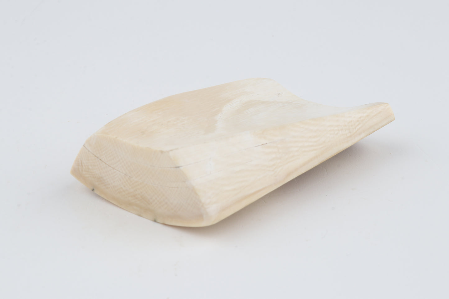 White-beige mammoth ivory piece