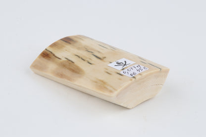 White-beige mammoth ivory piece