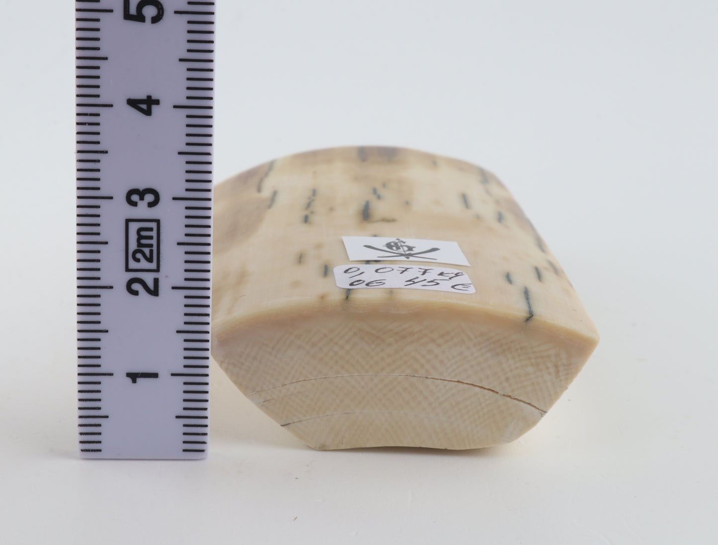 White-beige mammoth ivory piece
