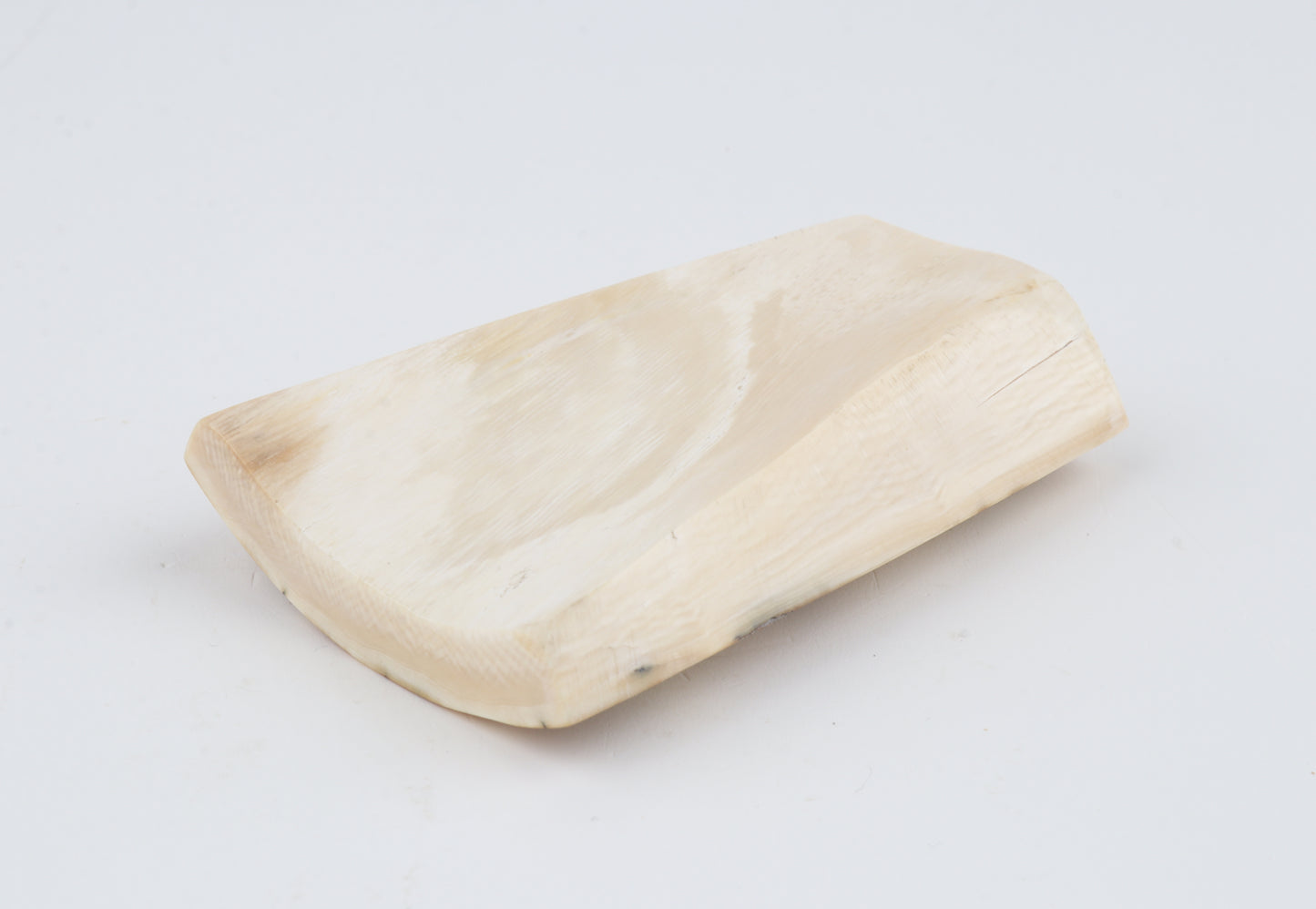 White-beige mammoth ivory piece