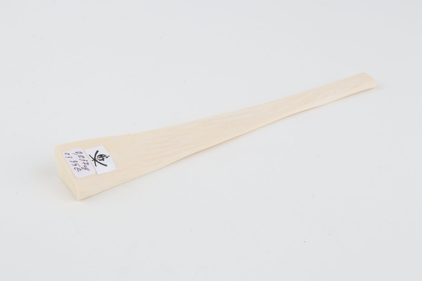 White mammoth ivory piece