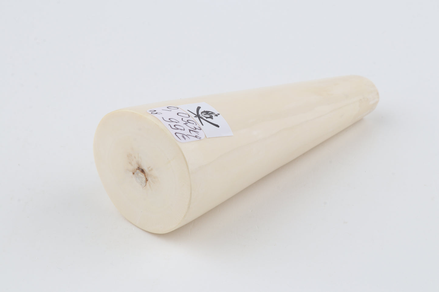 Round mammoth ivory piece