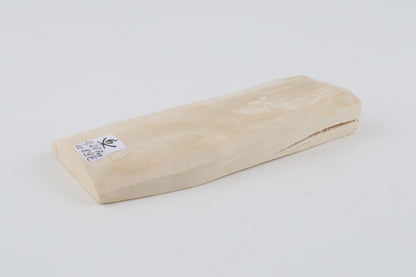 White mammoth ivory piece