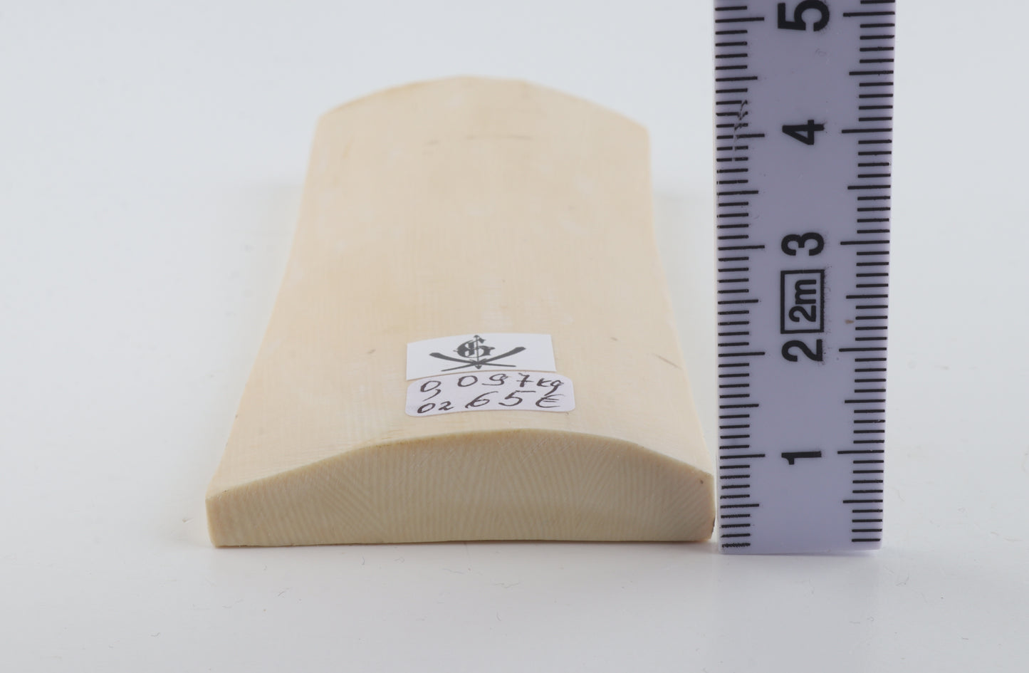 White mammoth ivory piece