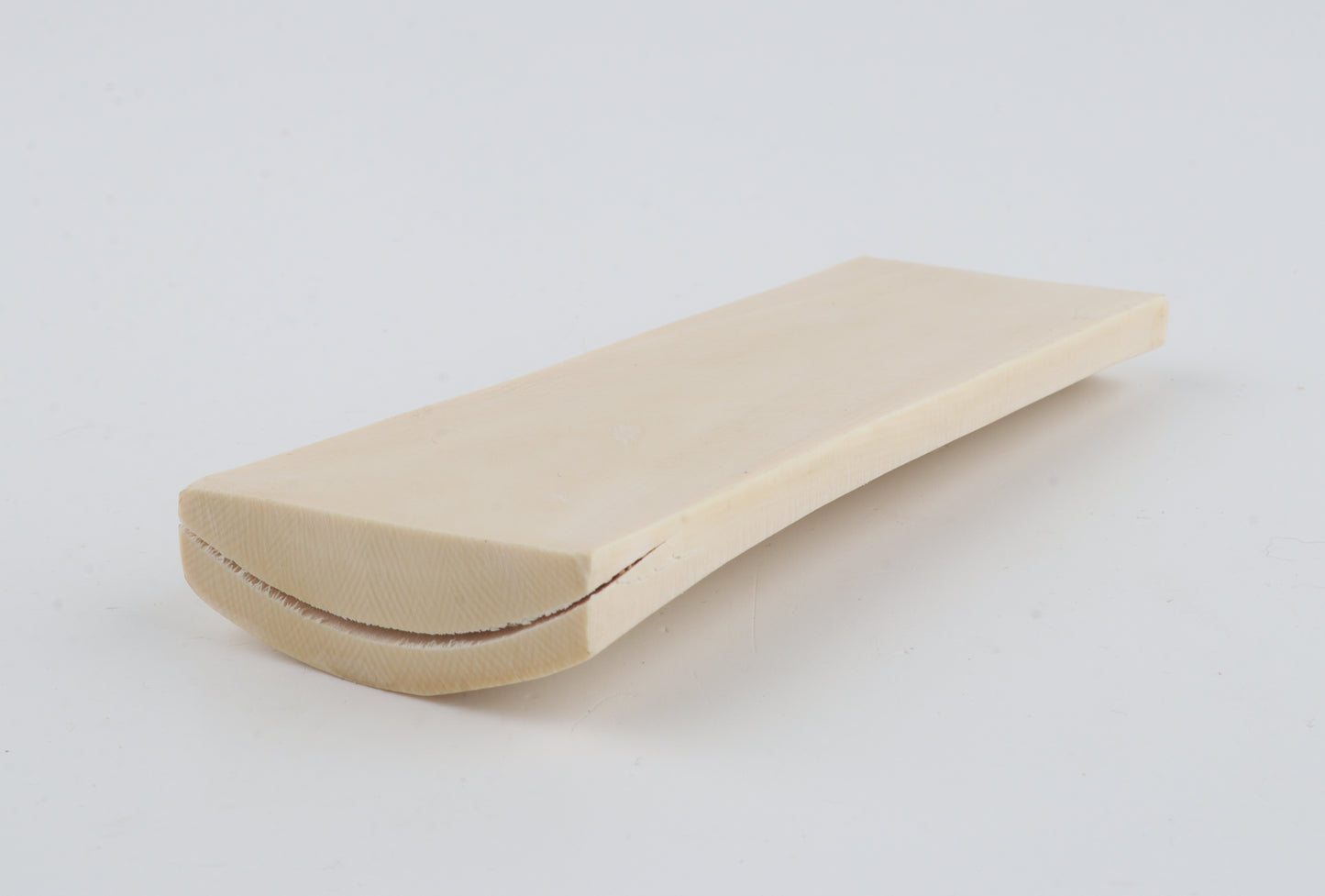 White mammoth ivory piece