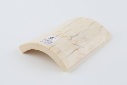 White mammoth ivory piece