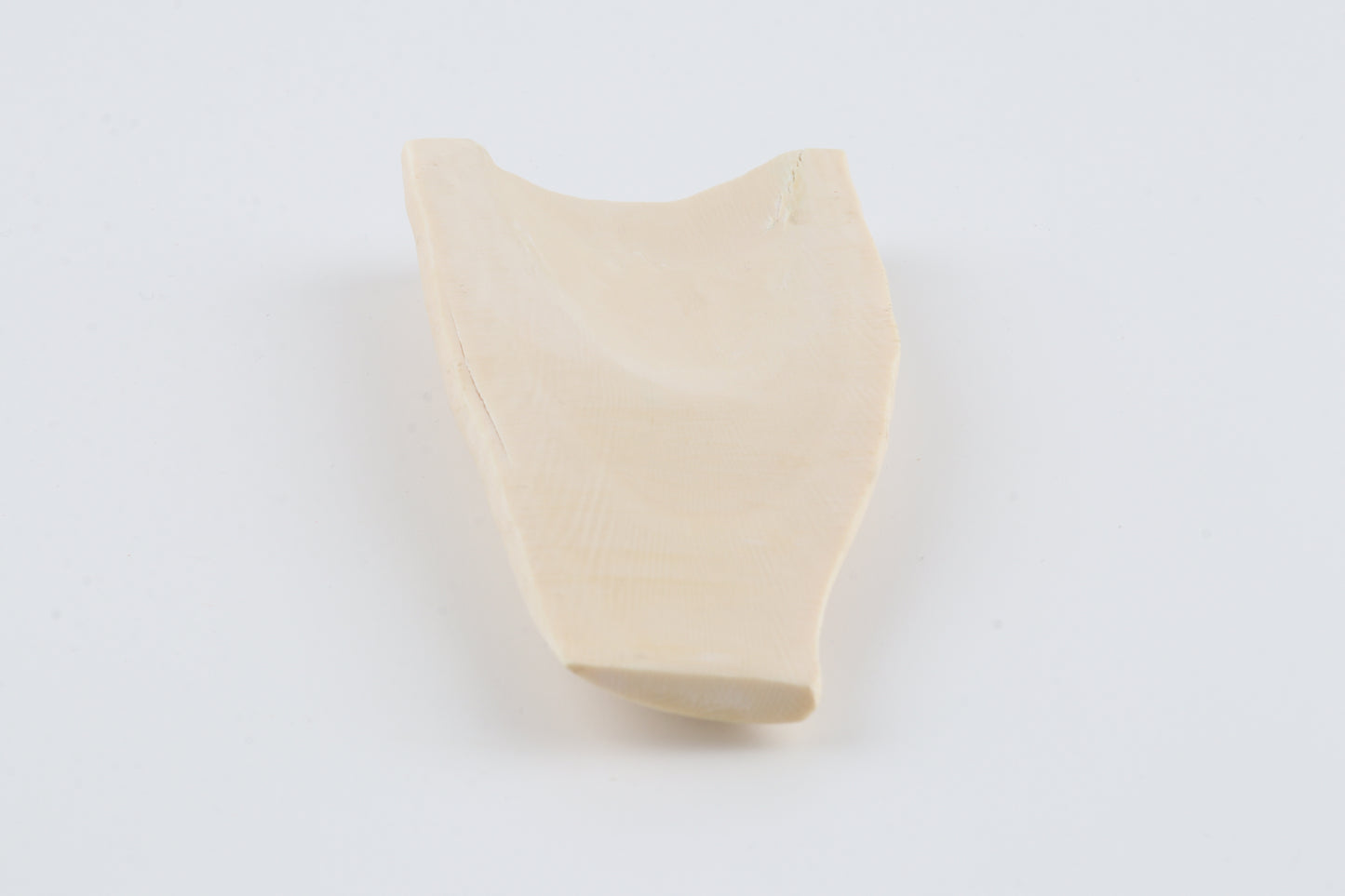 White mammoth ivory piece