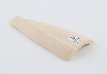 White mammoth ivory piece