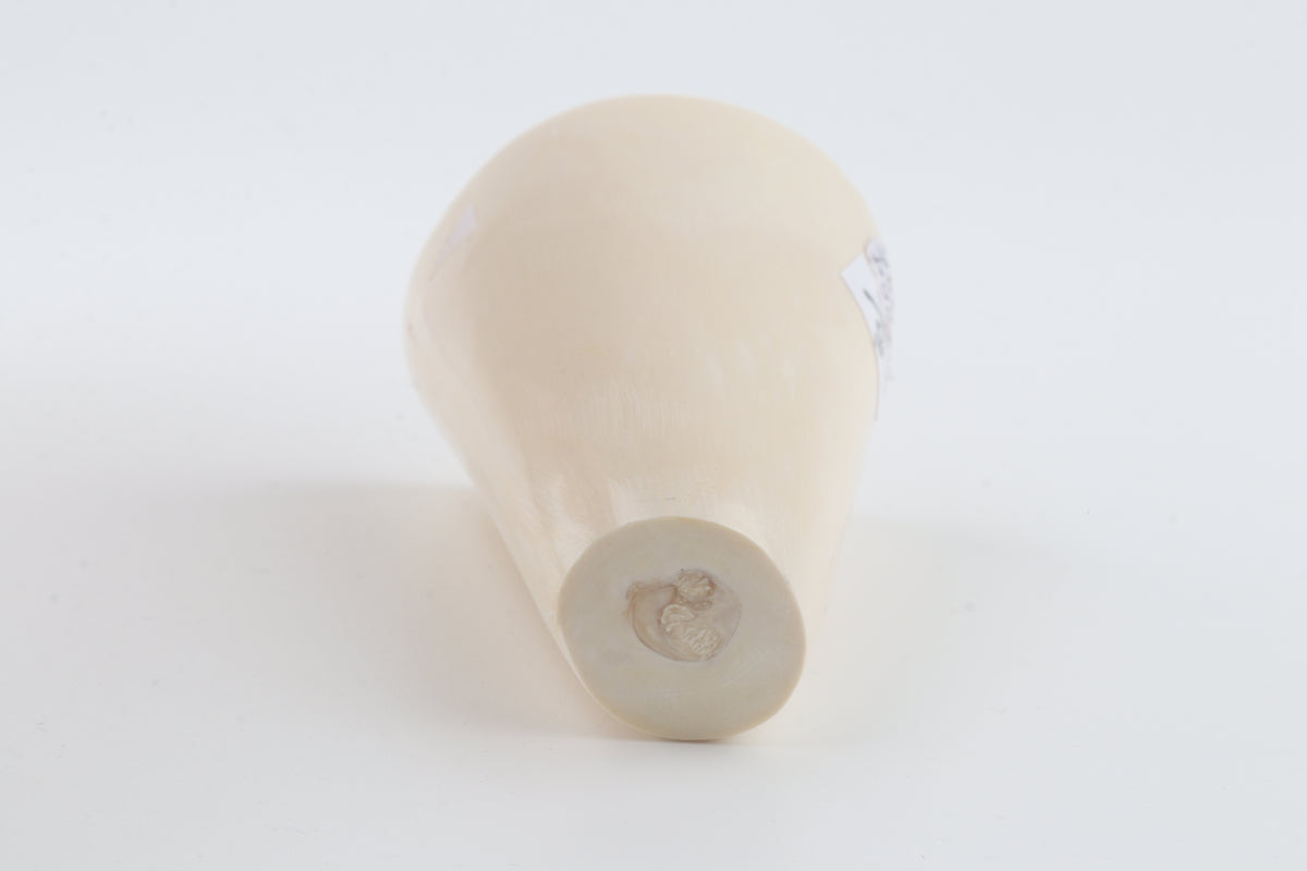 Round mammoth tusk piece