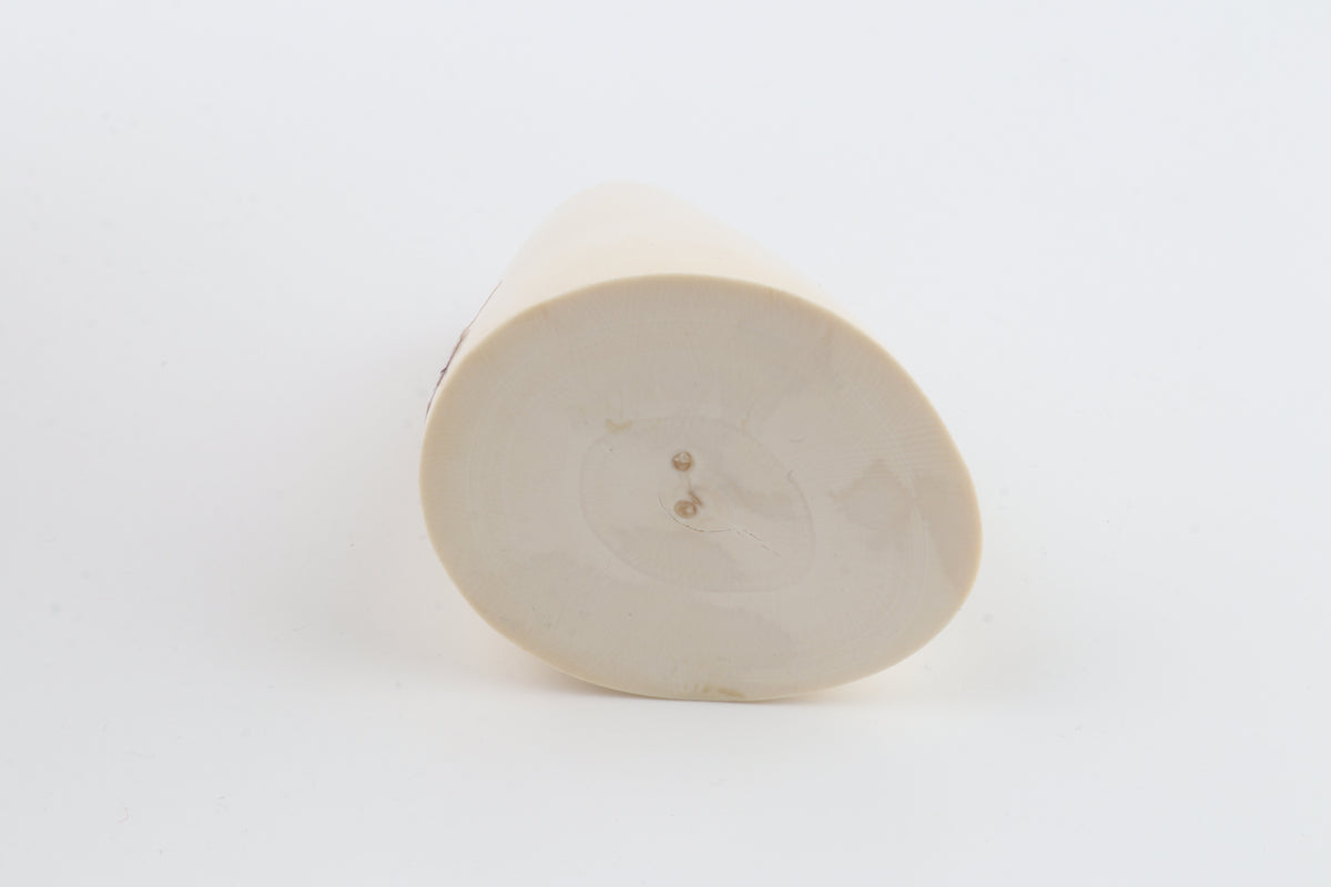 Round mammoth tusk piece