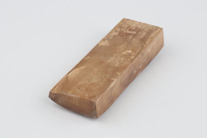 Brown mammoth ivory piece