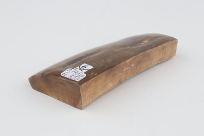 Brown mammoth ivory piece