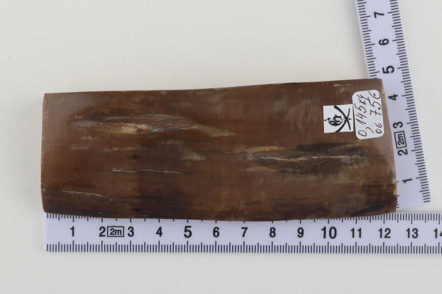 Brown mammoth ivory piece