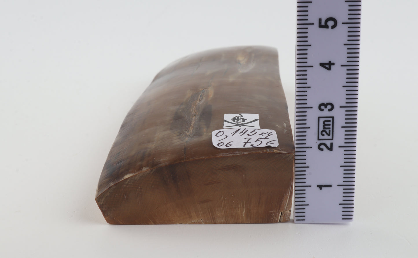 Brown mammoth ivory piece