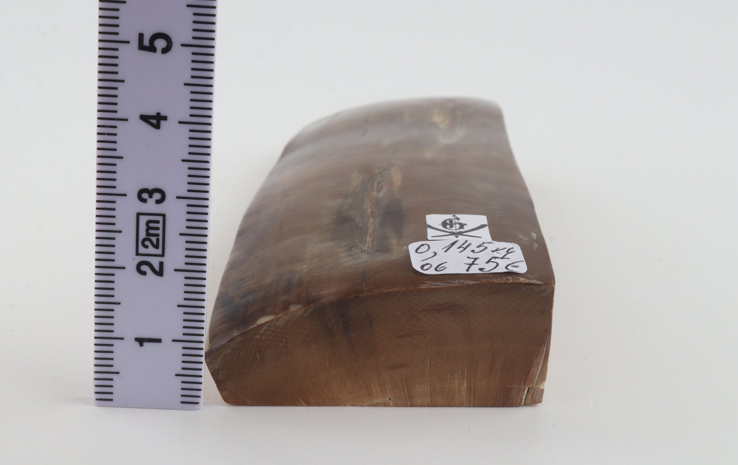 Brown mammoth ivory piece