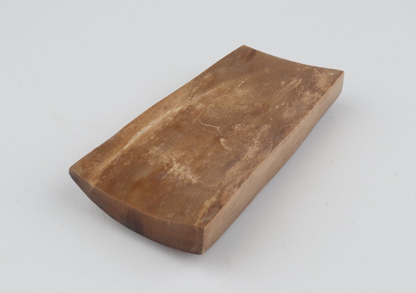 Brown mammoth ivory piece