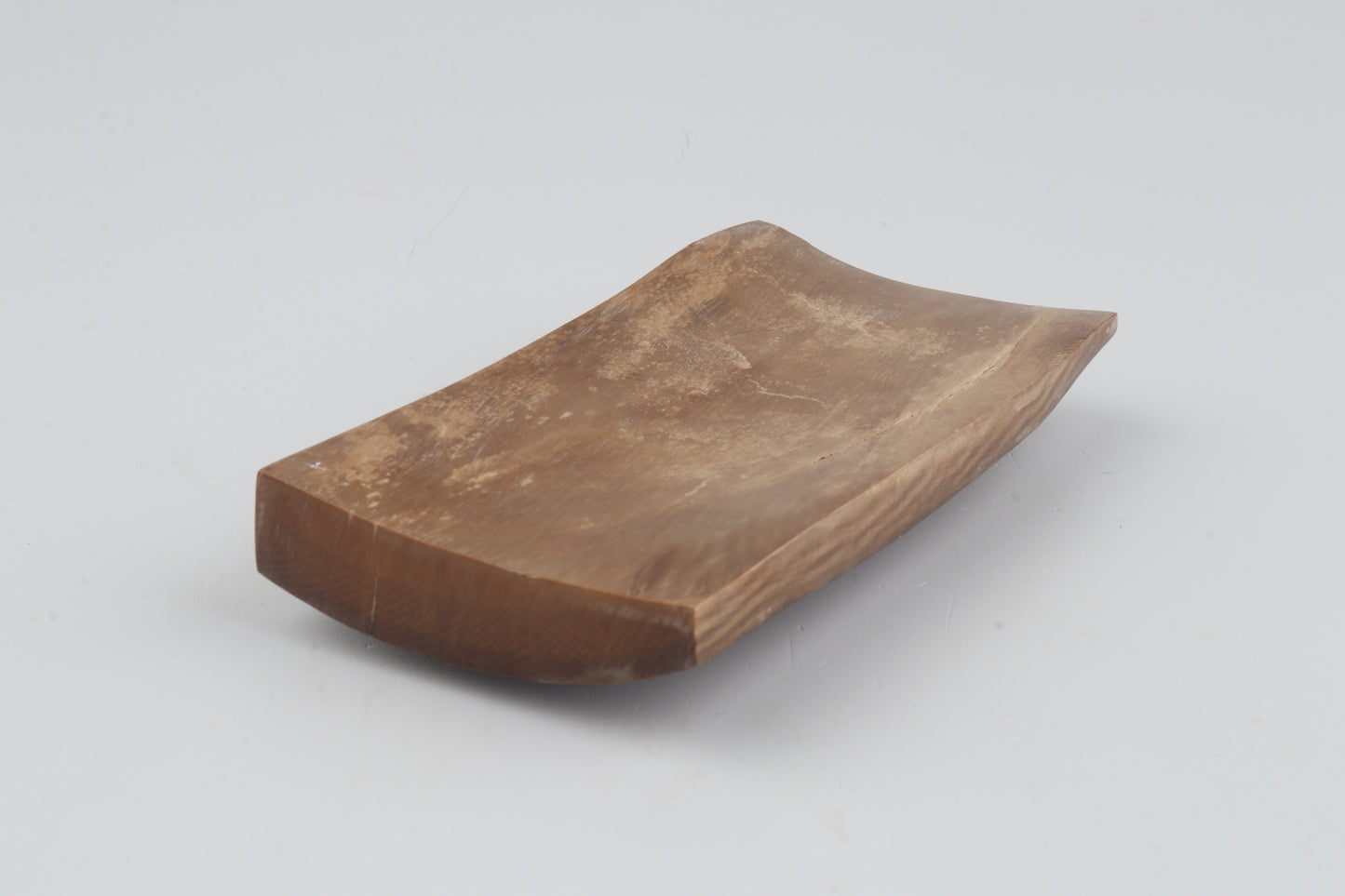 Brown mammoth ivory piece