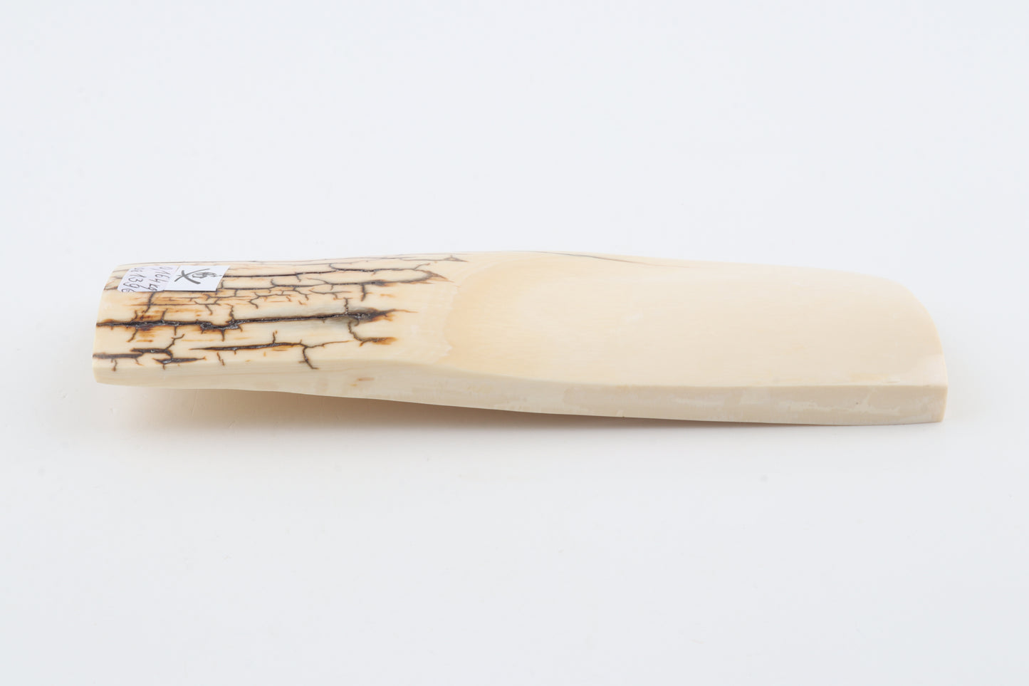 White mammoth ivory piece