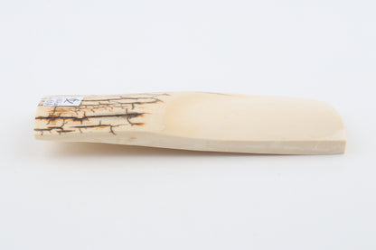 White mammoth ivory piece