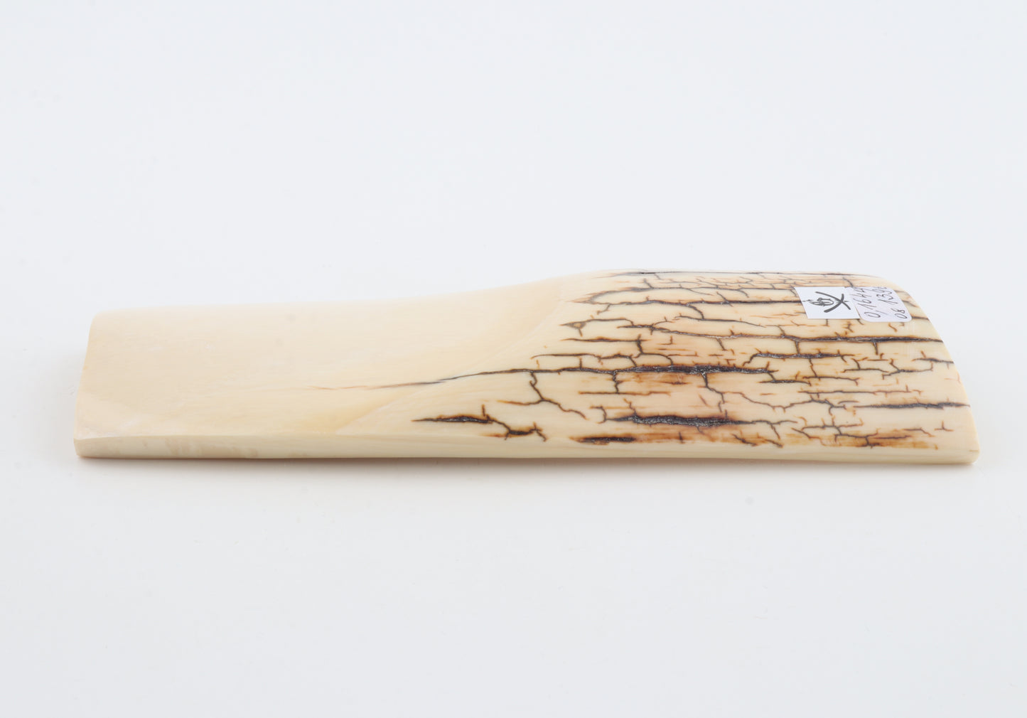 White mammoth ivory piece