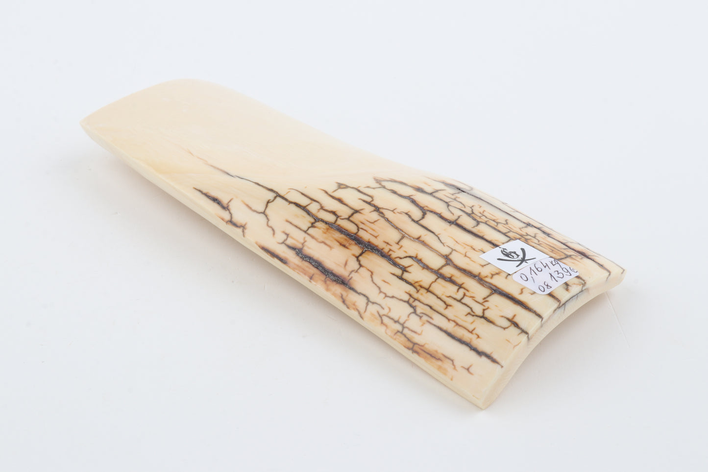 White mammoth ivory piece