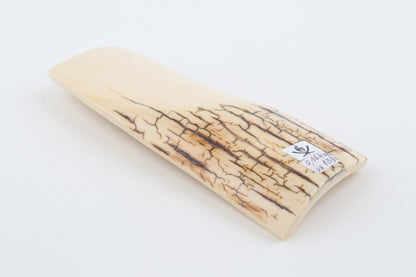 White mammoth ivory piece