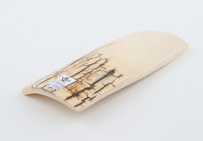 White mammoth ivory piece