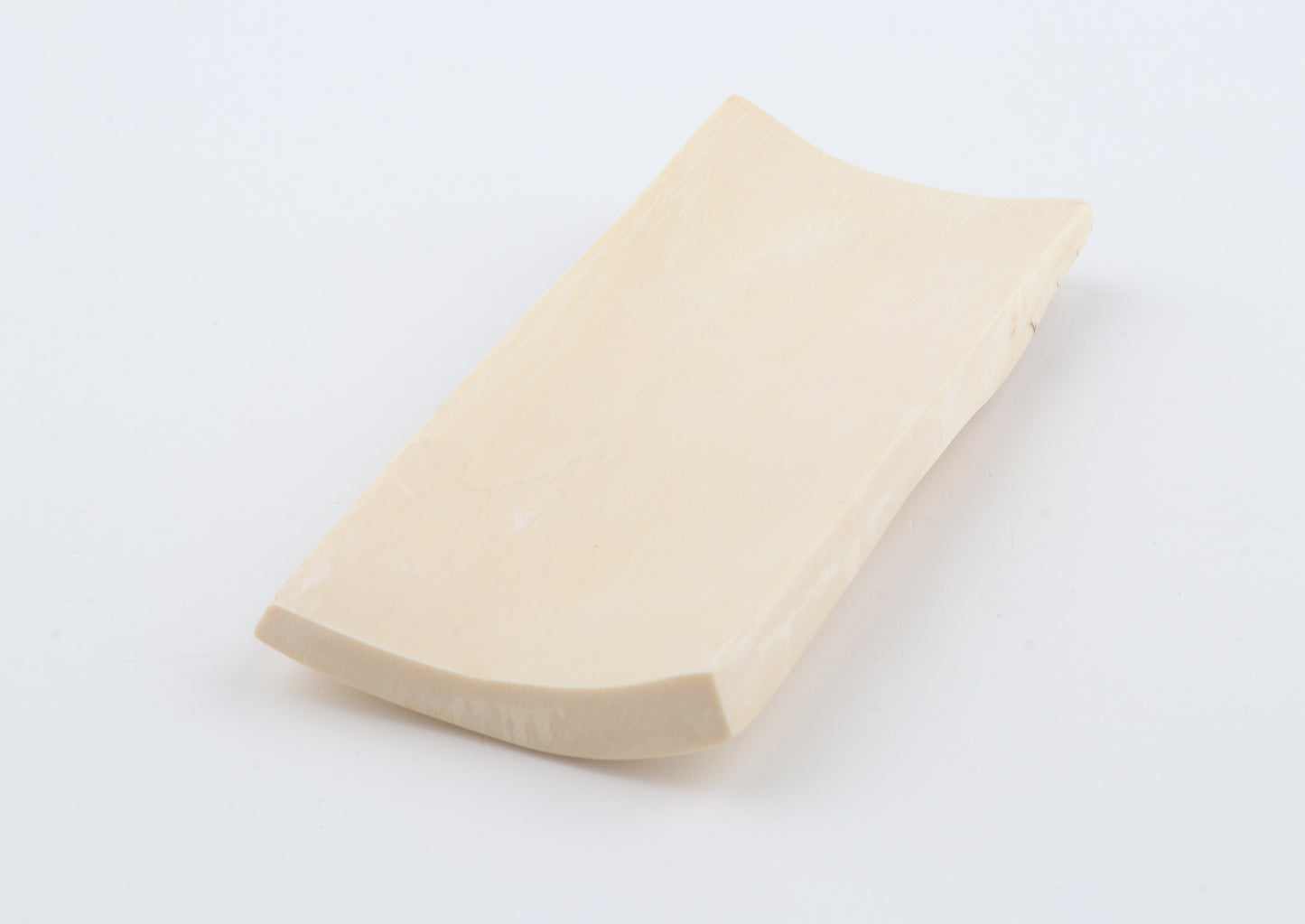 White mammoth ivory piece