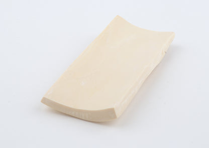 White mammoth ivory piece