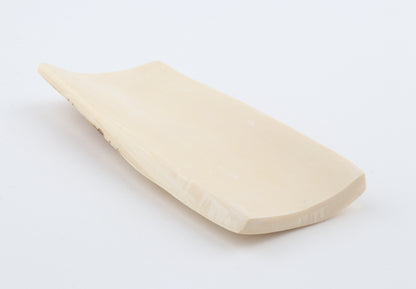 White mammoth ivory piece