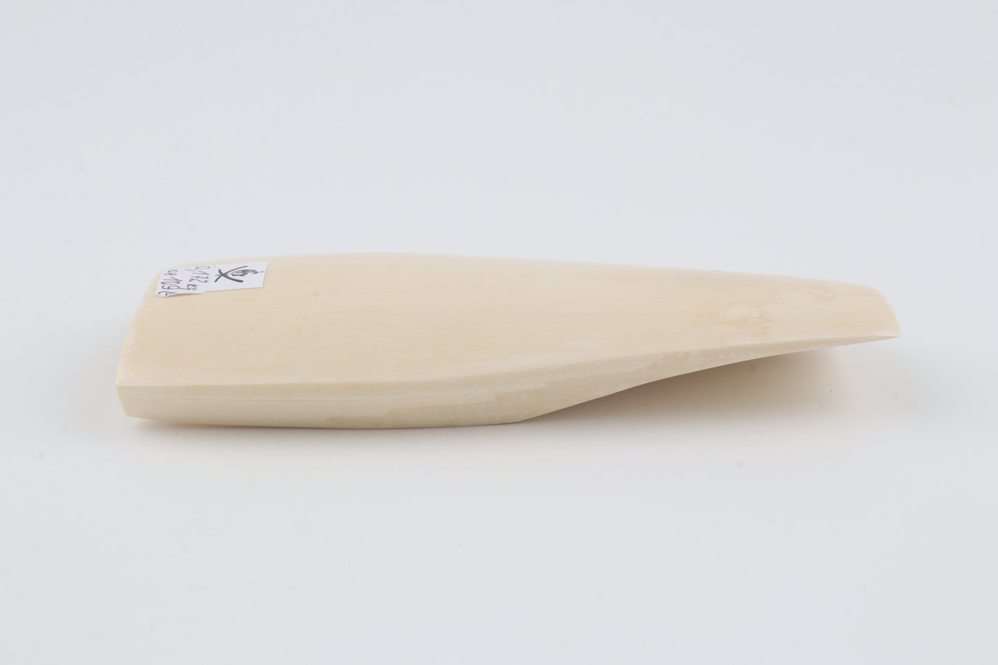 White mammoth ivory piece
