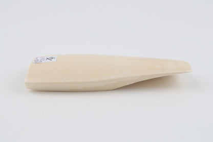 White mammoth ivory piece
