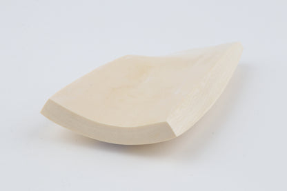 White mammoth ivory piece