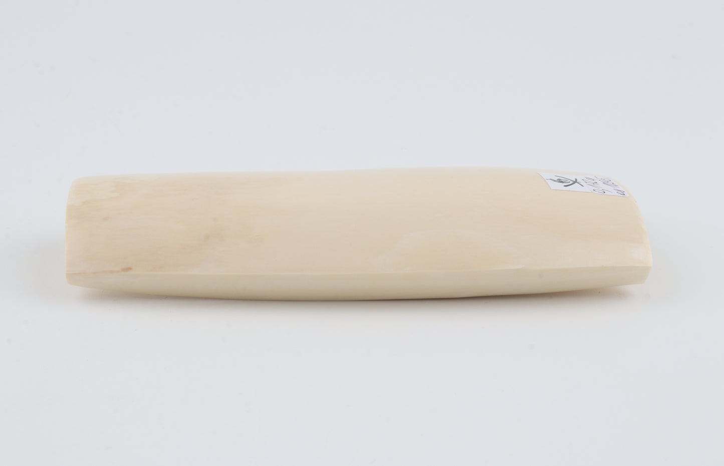 White mammoth ivory piece