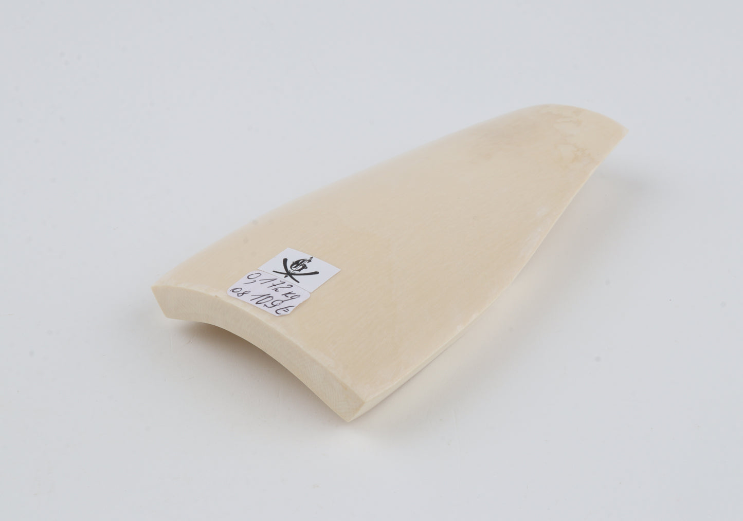 White mammoth ivory piece