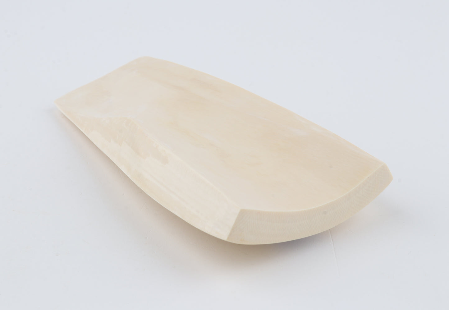 White mammoth ivory piece