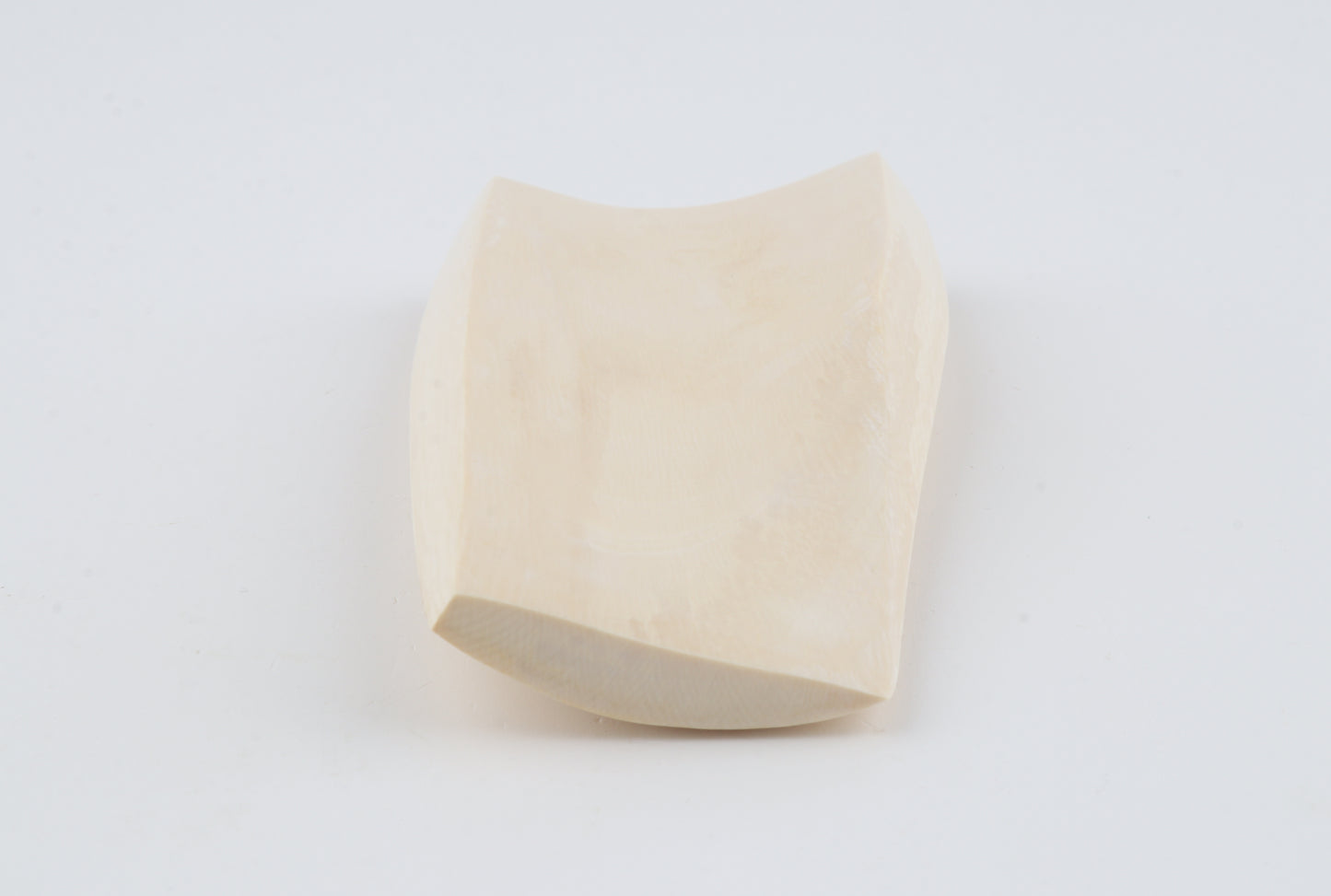 White mammoth ivory piece