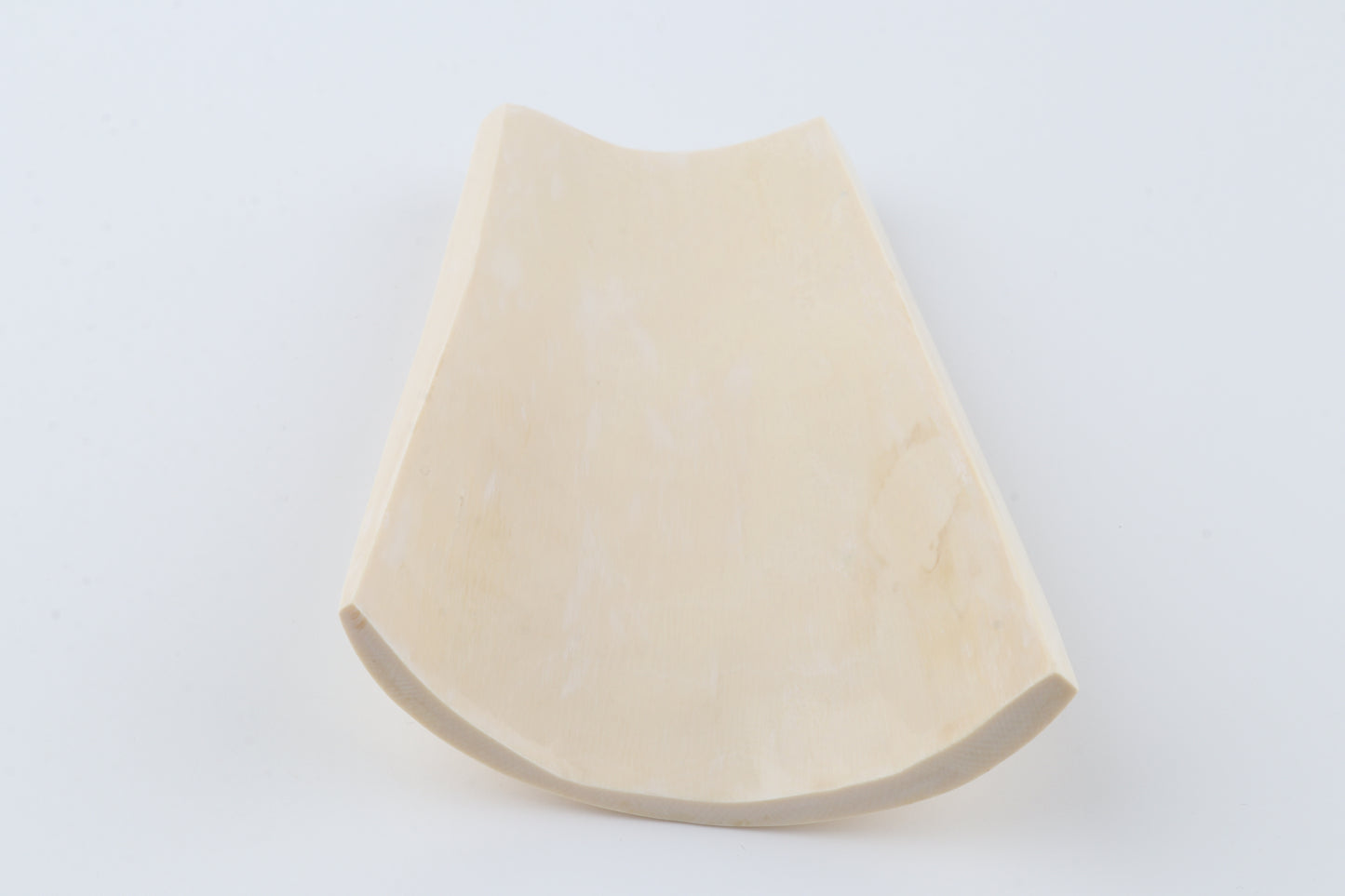 White mammoth ivory piece