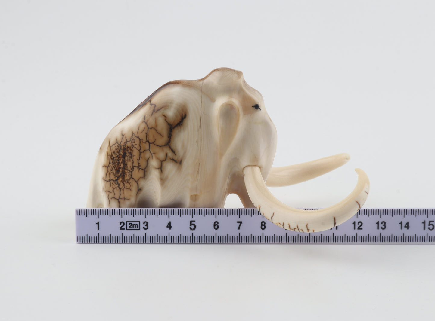Carved mammoth figurine