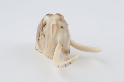 Carved mammoth figurine
