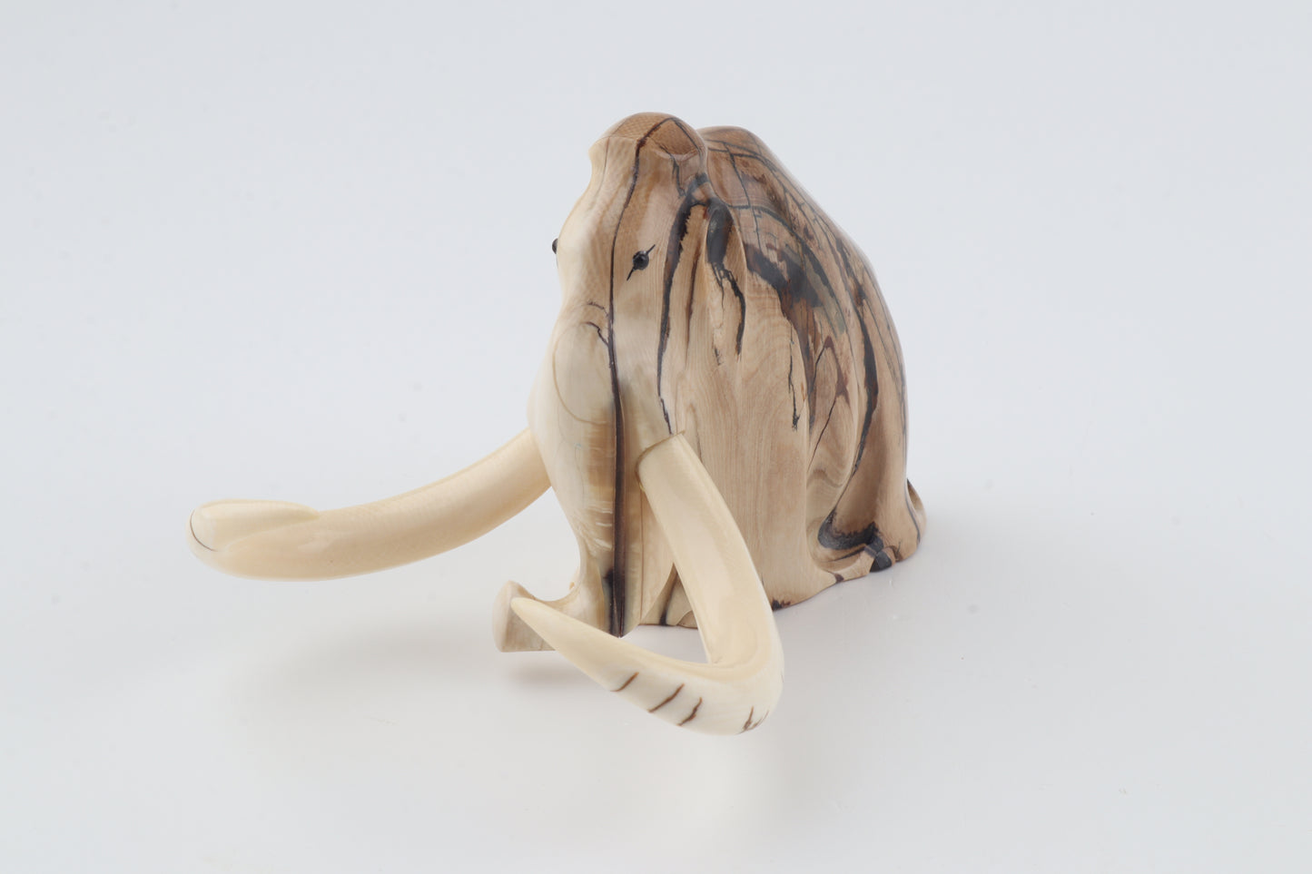 Carved mammoth figurine