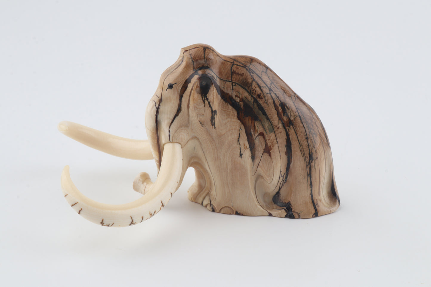 Carved mammoth figurine