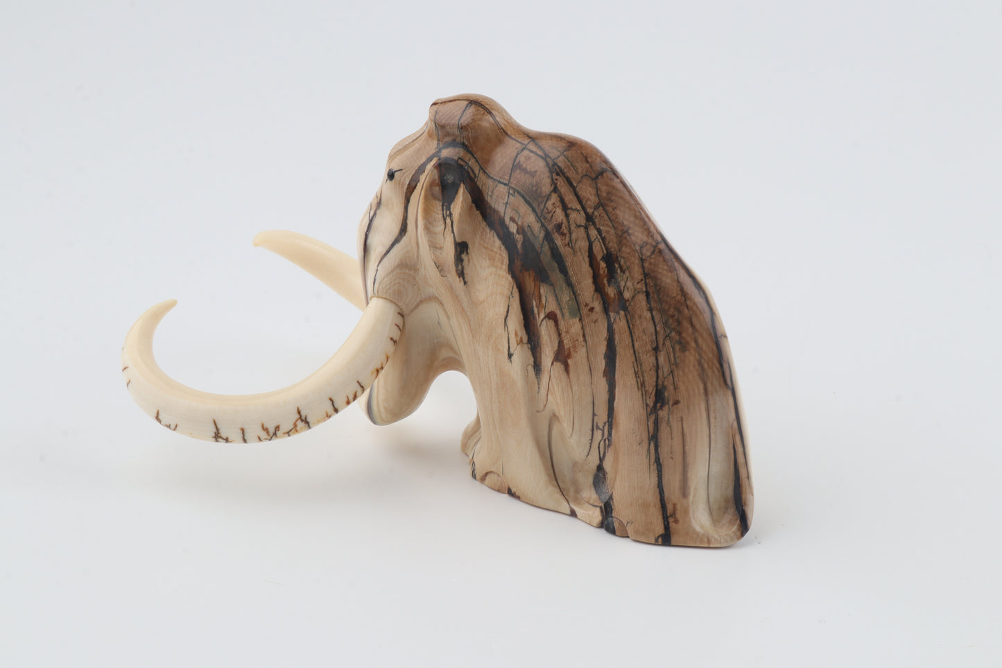 Carved mammoth figurine