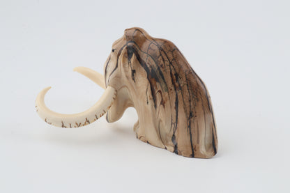 Carved mammoth figurine