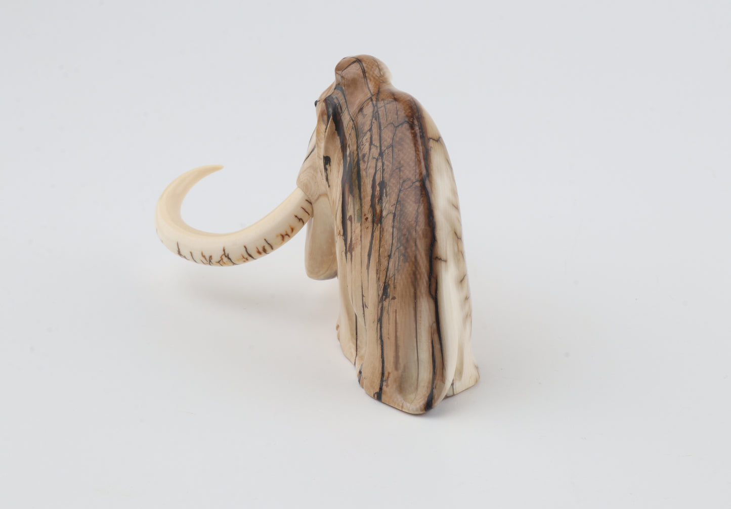Carved mammoth figurine