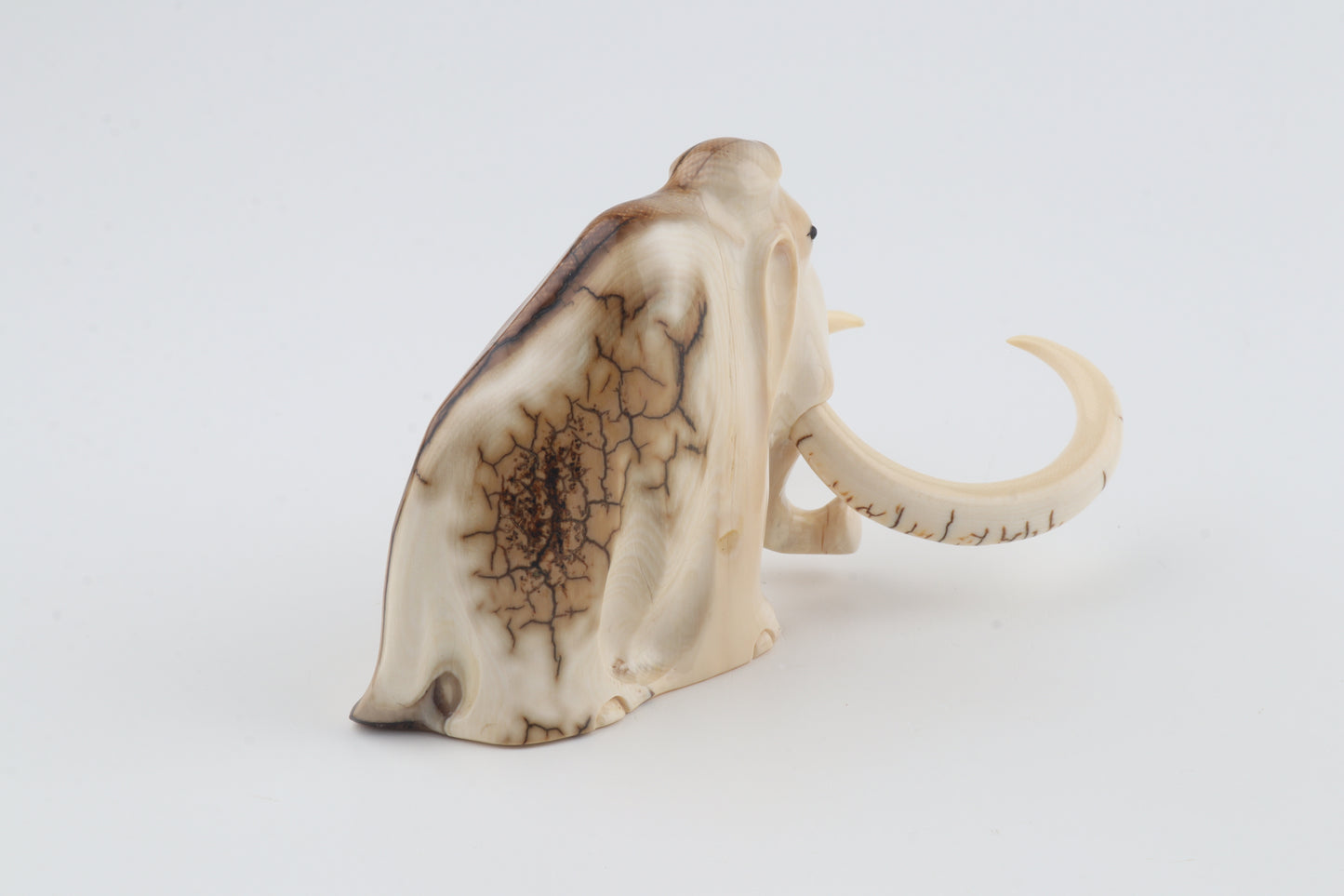 Carved mammoth figurine